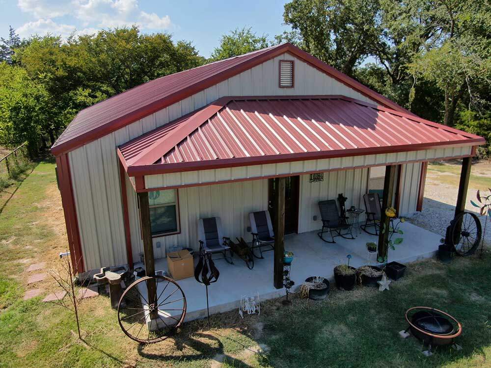 Seirra barndominium with front patio